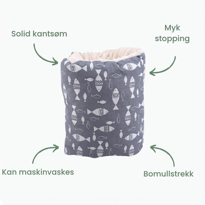 Armputens egenskaper: kantsøm, myk stopping, vaskbar, bomull