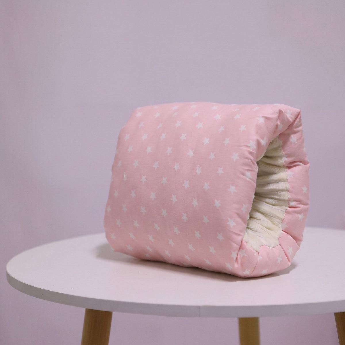 Armpute for amming i rosa med hvite stjerner