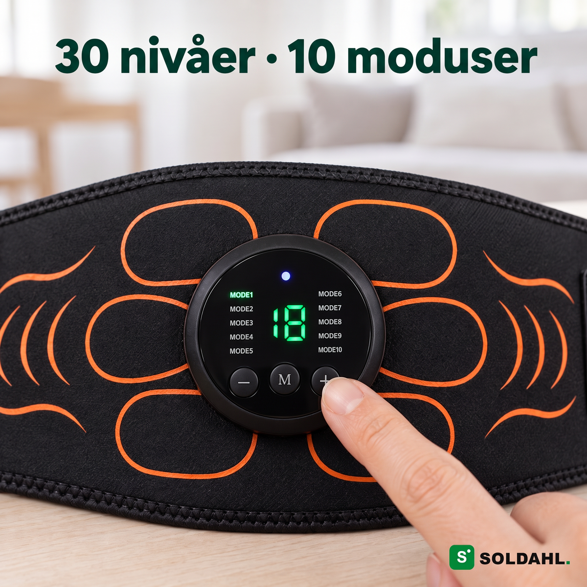 Nærbilde av magebeltets kontroll med display, 30 nivåer og 10 moduser